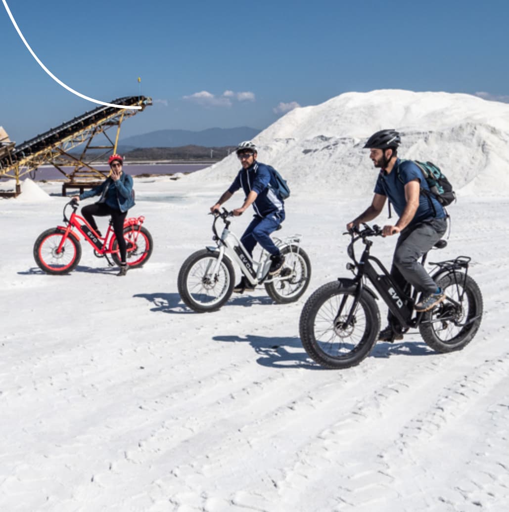 Mountine bikers on sandy road